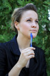 Attractive Young Businesswoman Deciding
