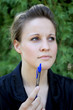 Attractive Young Businesswoman With Pen