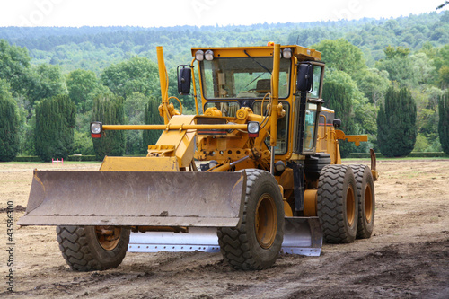 Photo: Véhicule niveleuse chantier travaux publics Véhicule niveleuse chantier travaux publics
