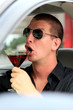 Man In Truck Sipping Alcohol