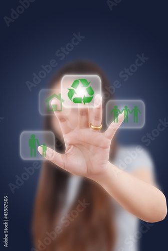 Photo: business lady pushing recycle button on the whiteboard. business lady pushing recycle button on the whiteboard.