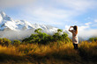 Young person with digital camera