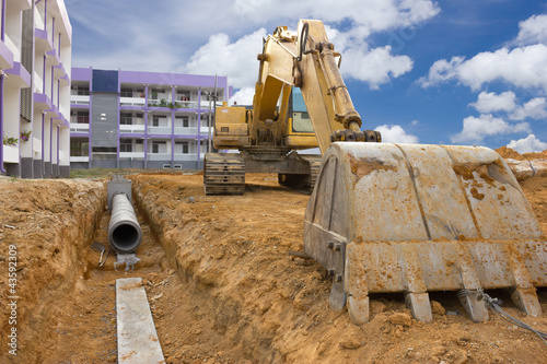 Photo: Digging drains to prevent flooding Digging drains to prevent flooding