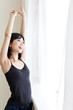 a young asian woman relaxing in morning