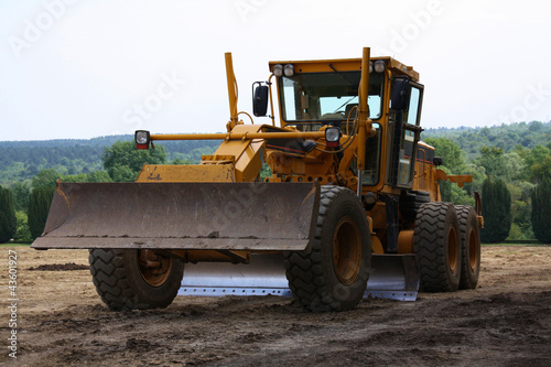 Photo: Véhicule niveleuse chantier travaux publics Véhicule niveleuse chantier travaux publics