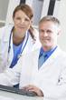 Male Female Hospital Doctors Using Computer