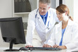 Male Female Hospital Doctors Using Computer