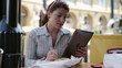 Video: Happy young woman with tablet computer in cafe Happy young woman with tablet computer in cafe