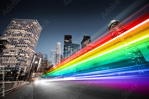 Photo: Colorful rainbow bus traffic blur in city Colorful rainbow bus traffic blur in city