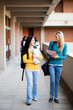 young college students walking on campus