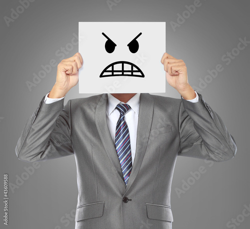 Photo: businessman with angry mask businessman with angry mask