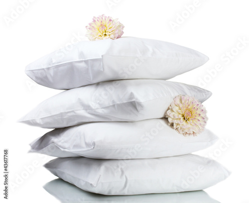 Photo: pillows and flowers, on grey background pillows and flowers, on grey background