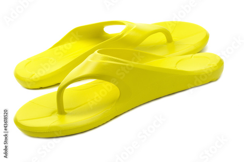 Photo: Yellow flip flops, white background Yellow flip flops, white background