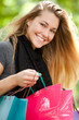 Happy woman with shopping bags