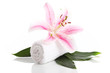 Towel and pink lily flower