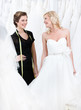 Bride is happy that the dress fits well
