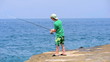 Vídeo : teen fishing from the shore teen fishing from the shore