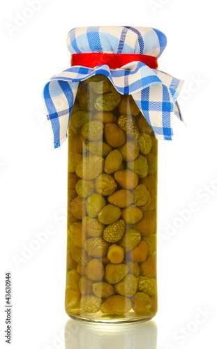 Photo: Glass jar with tinned capers isolated on white Glass jar with tinned capers isolated on white