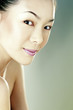 Studio shot of a lady with her hair tied up
