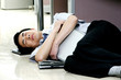 Man sleeping on the office floor 