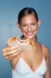 Woman eating bread