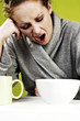 Sleepy woman yawning