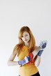 Woman with gloves holding a saw