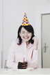 Woman celebrating her birthday alone