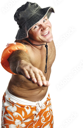 Photo: Man in beachwear showing a swimming style Man in beachwear showing a swimming style