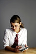 Photo: Businesswoman using calculator Businesswoman using calculator