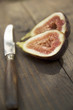 A knife and cut fig
