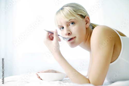 Photo: Woman eating Woman eating