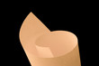 Rolled up paper against a black background