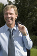 Businessman taking a stroll in the park