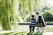 Boy fishing with his younger brother