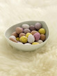 Mini eggs on sheepskin rug