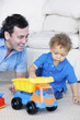 Photo : Father playing with son Father playing with son
