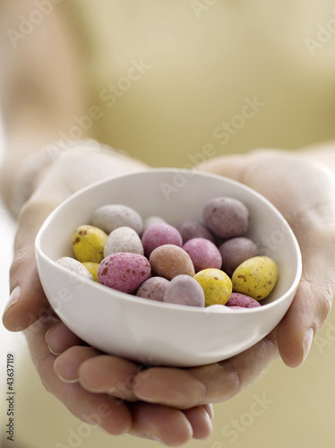 Photo: Mini eggs in bowl with model Mini eggs in bowl with model