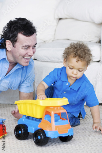 Photo: Father playing with son Father playing with son