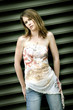 A pretty teenage girl posing for the camera