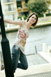 A pretty teenage girl posing for the camera