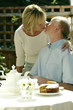 Senior couple kissing