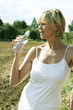 Senior woman holding a bottled drinking water