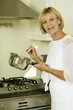 Senior woman cooking in the kitchen