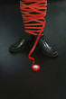Businessman tied up in red tape