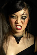 Photo: Woman with smudged mascara clenching her teeth Woman with smudged mascara clenching her teeth