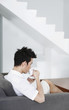 Man enjoying a cup of coffee at home