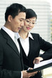 Businessman and businesswoman having discussion