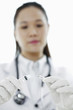 Female doctor with a syringe