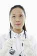 Female doctor with a syringe